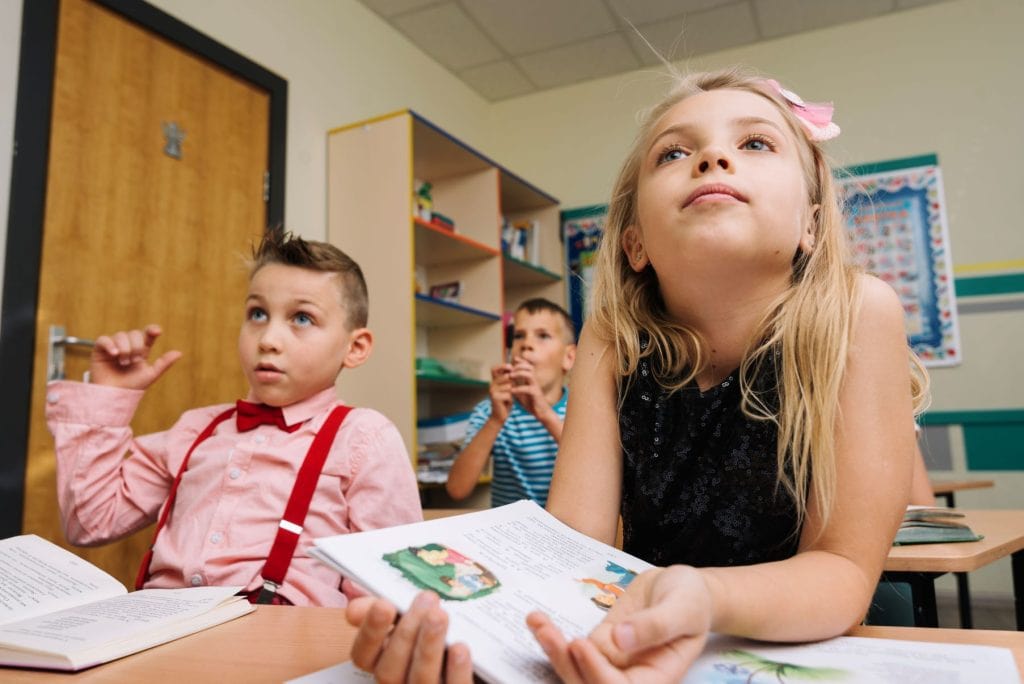 Children being focused during class